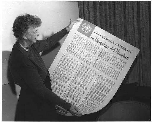 Image by Blatant World/Creative commons (CC BY2.0)Eleanor Roosevelt holding the UN Declaration of Human Rights in Spanish at Lake Success, New York.